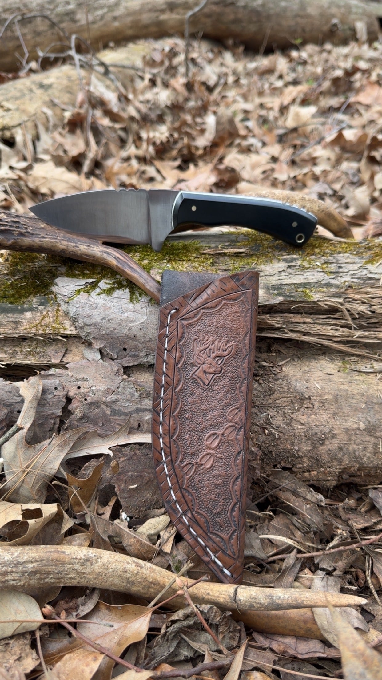 80crv2 blade with black paper micarta W/ brass pins